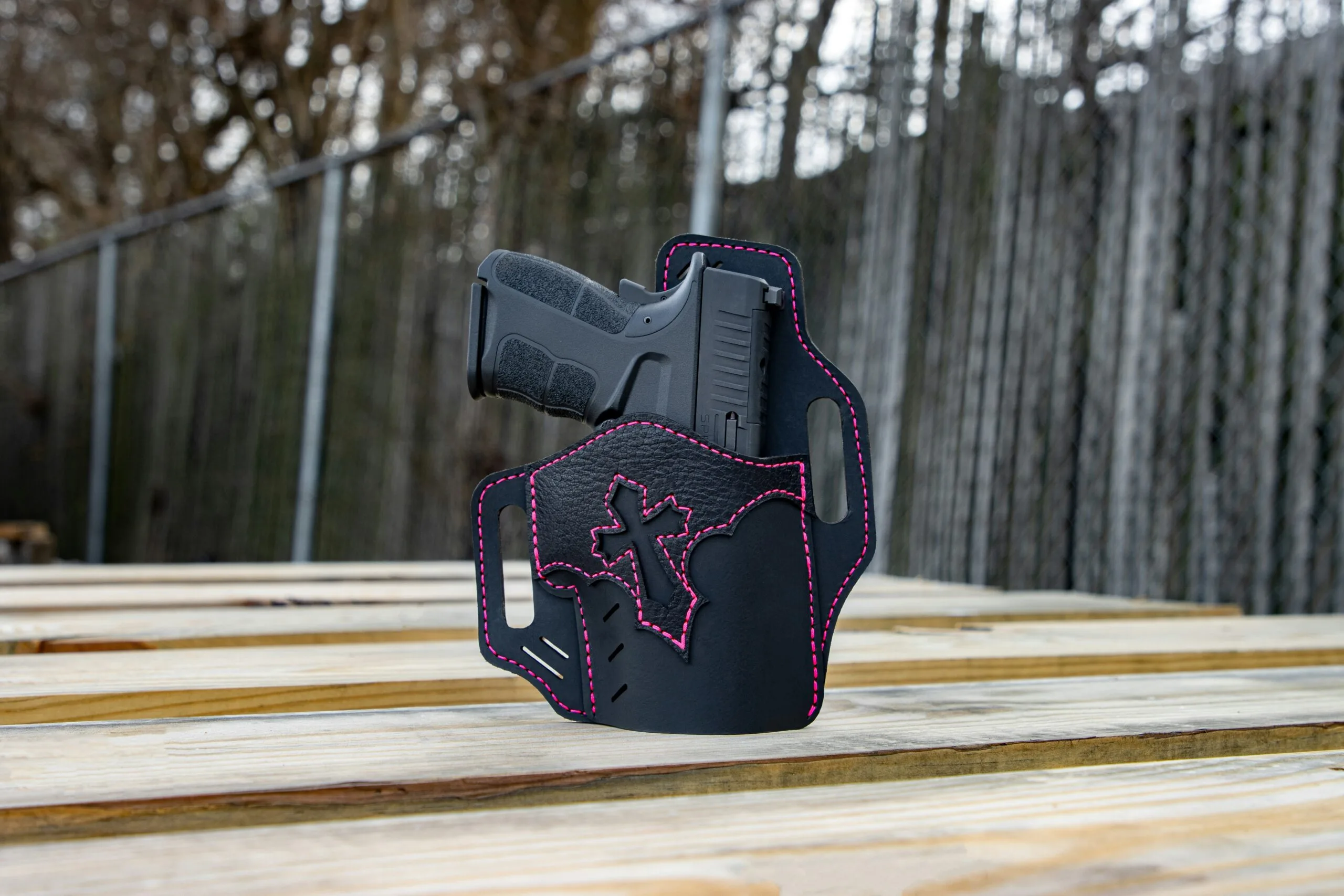 7 Essential Tips Before Buying 3DP90 Built Kit for Sale in 2025 1 a black holster with pink stitching on it